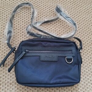 Neo. Longchamp le pliage neo camera crossbody bag in blue.